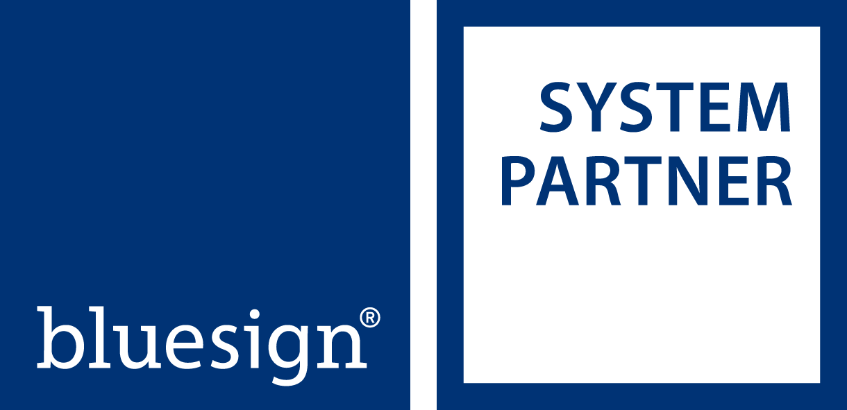 Bluesign system partner logo featuring the bluesign® logo on a dark blue background and "SYSTEM PARTNER" written in blue on a white background.